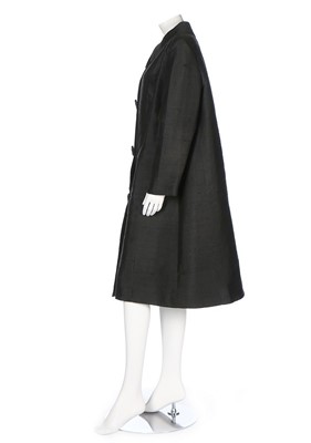 Lot 118 - A Pierre Balmain couture slubbed silk coat,...