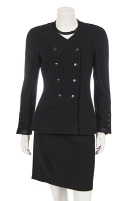 Lot 164 - A Chanel by Karl Lagerfeld black wool crêpe suit, Cruise collection 1996