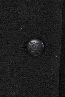 Lot 164 - A Chanel by Karl Lagerfeld black wool crêpe suit, Cruise collection 1996