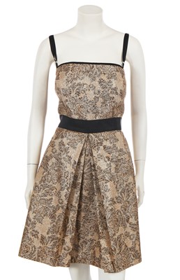 Lot 275 - A Dolce and Gabbana beige cotton and gold lurex ensemble, 2000s