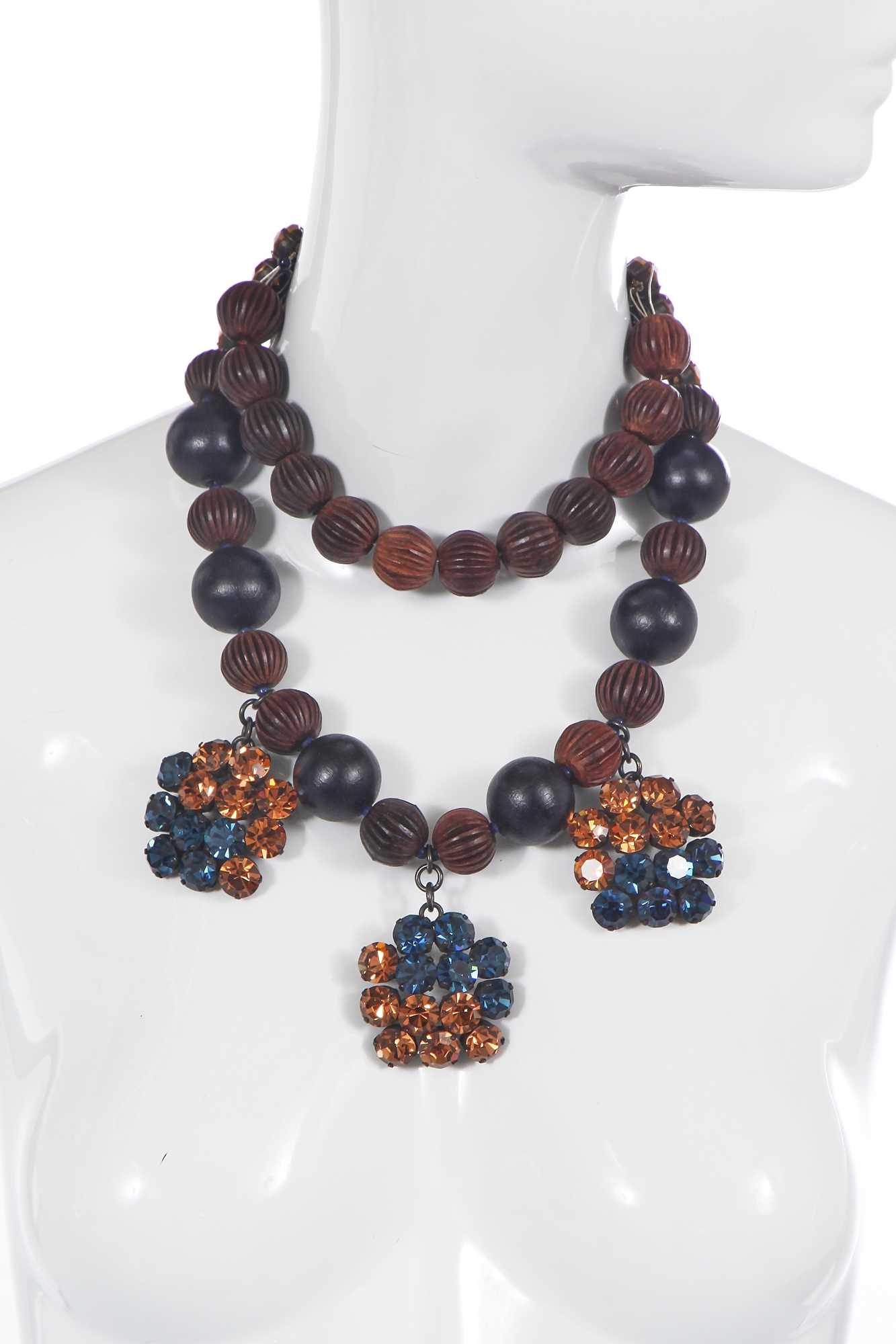 Lot 439 - An Yves Saint Laurent wooden bead choker necklace, 1980s