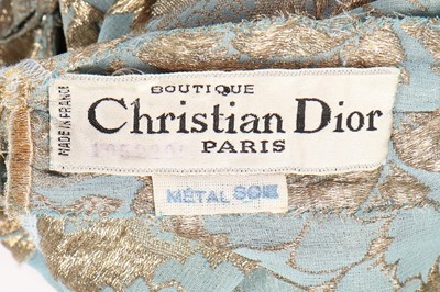 Lot 176 - A Christian Dior cloqué lamé cocktail dress,...