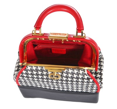 Lot 183 - A Christion Dior houndstooth print leather bag, circa 1994