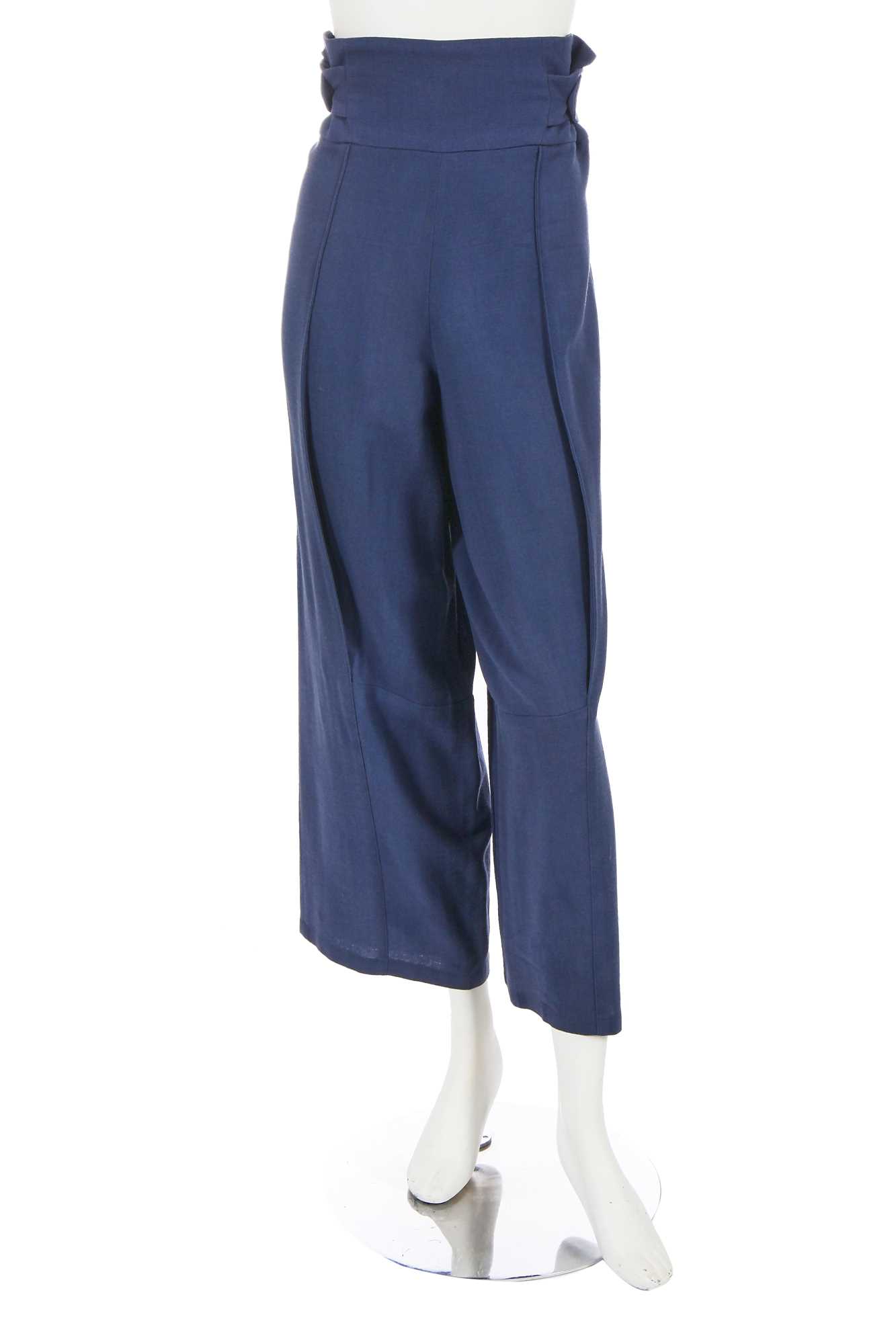 Lot 406 - A pair of John Galliano blue wool crêpe trousers, 'Hairclips' collection, Autumn-Winter 1988-89