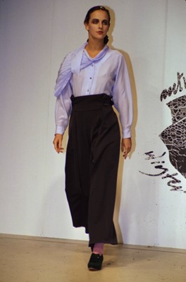 Lot 406 - A pair of John Galliano blue wool crêpe trousers, 'Hairclips' collection, Autumn-Winter 1988-89