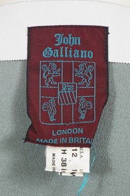 Lot 357 - A John Galliano blue-grey wool crêpe tulip skirt, circa 1990