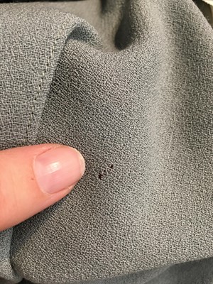 Lot 357 - A John Galliano blue-grey wool crêpe tulip skirt, circa 1990