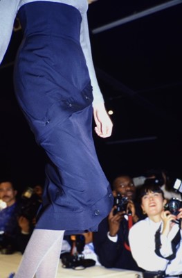 Lot 409 - A John Galliano high-waisted navy wool skirt, 'The Rose' collection, Autumn-Winter 1987-88