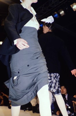 Lot 409 - A John Galliano high-waisted navy wool skirt, 'The Rose' collection, Autumn-Winter 1987-88