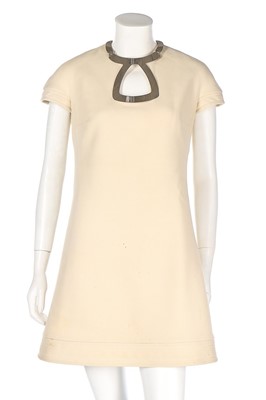 Lot 348 - A Pierre Cardin ivory wool mini-dress, late...