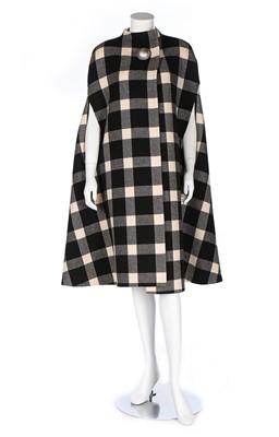 Lot 262 - A Pauline Trigere checked wool cape, late 60s...