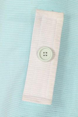 Lot 263 - A Courreges turquoise and white cotton pique...
