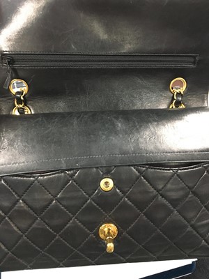 Lot 28 - A Chanel quilted navy blue lambskin leather Classic double flap bag, 2000-2002