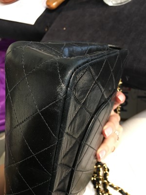 Lot 28 - A Chanel quilted navy blue lambskin leather Classic double flap bag, 2000-2002