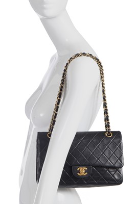 Lot 28 - A Chanel quilted navy blue lambskin leather Classic double flap bag, 2000-2002