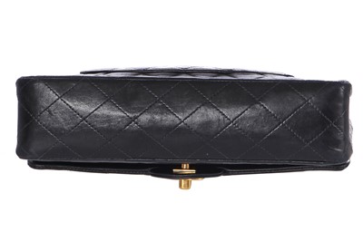 Lot 28 - A Chanel quilted navy blue lambskin leather Classic double flap bag, 2000-2002
