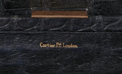 Lot 45 - A Cartier black crocodile handbag, 1959
