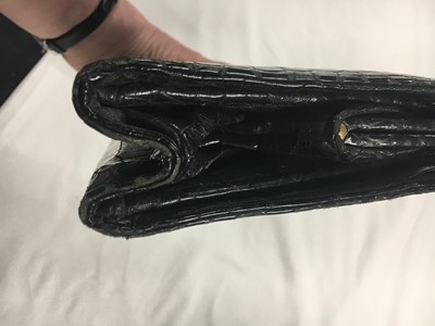 Lot 45 - A Cartier black crocodile handbag, 1959