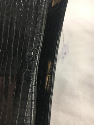 Lot 45 - A Cartier black crocodile handbag, 1959