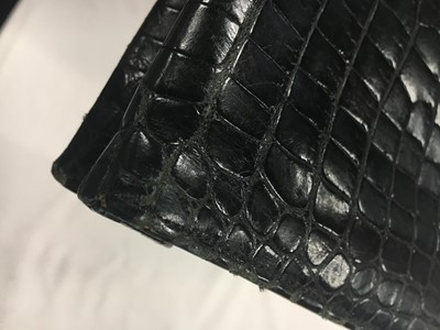 Lot 45 - A Cartier black crocodile handbag, 1959