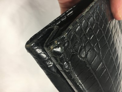 Lot 45 - A Cartier black crocodile handbag, 1959