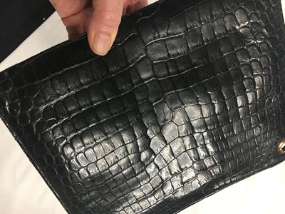 Lot 45 - A Cartier black crocodile handbag, 1959