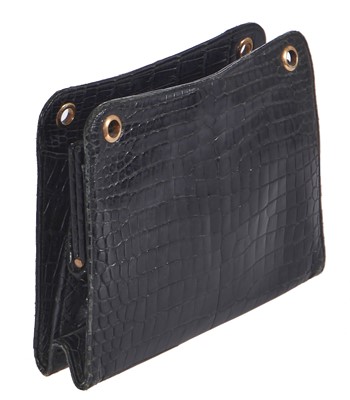 Lot 45 - A Cartier black crocodile handbag, 1959