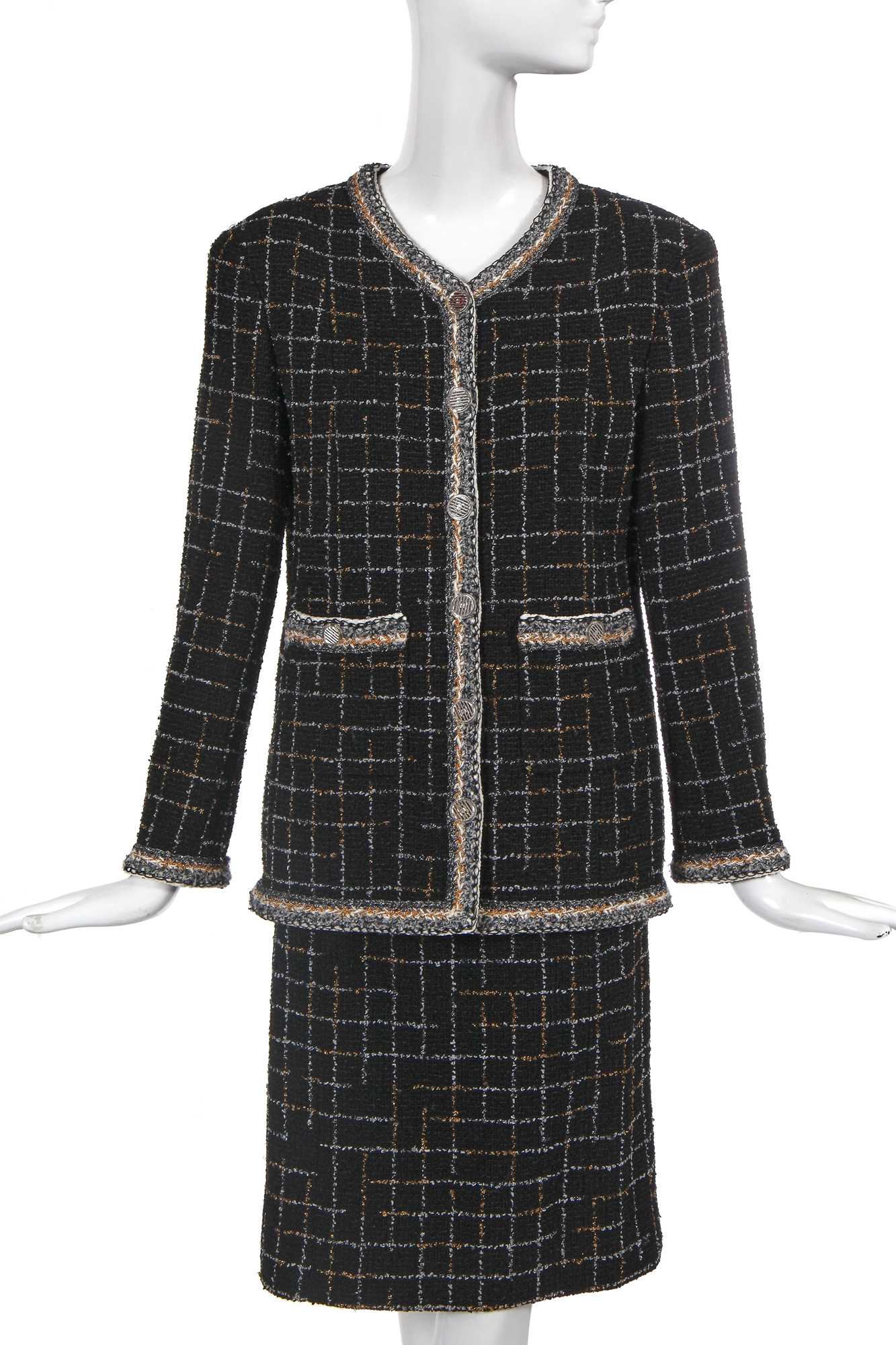 Lot 12 - A Chanel by Karl Lagerfeld checked bouclé tweed suit, 'Intimate Technology' collection, Spring-Summer 2017