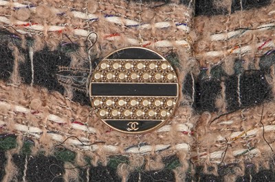 Lot 4 - A Chanel by Karl Lagerfeld striped fantasy tweed suit, 'Egyptomania' collection, Métiers d'Art, Pre-Fall 2019