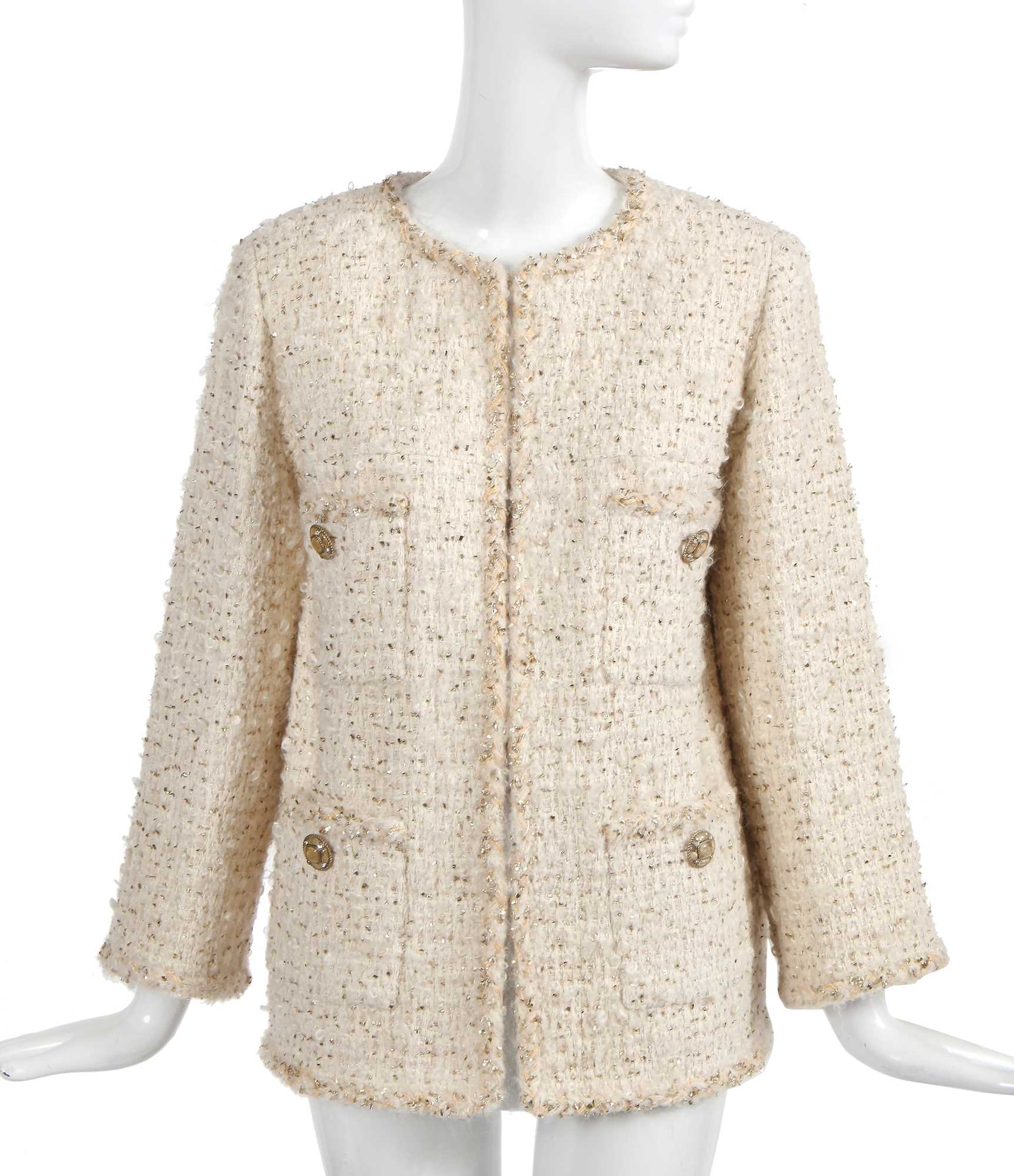 Lot 5 - A Chanel by Karl Lagerfeld ivory wool bouclé tweed jacket, 'Egyptomania' collection, Métiers d'Art, Pre-Fall 2019