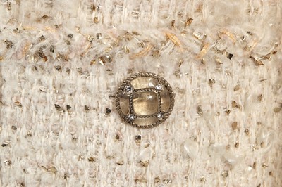 Lot 5 - A Chanel by Karl Lagerfeld ivory wool bouclé tweed jacket, 'Egyptomania' collection, Métiers d'Art, Pre-Fall 2019