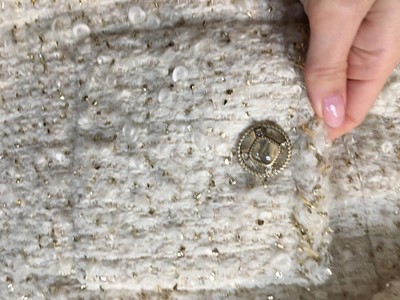 Lot 5 - A Chanel by Karl Lagerfeld ivory wool bouclé tweed jacket, 'Egyptomania' collection, Métiers d'Art, Pre-Fall 2019