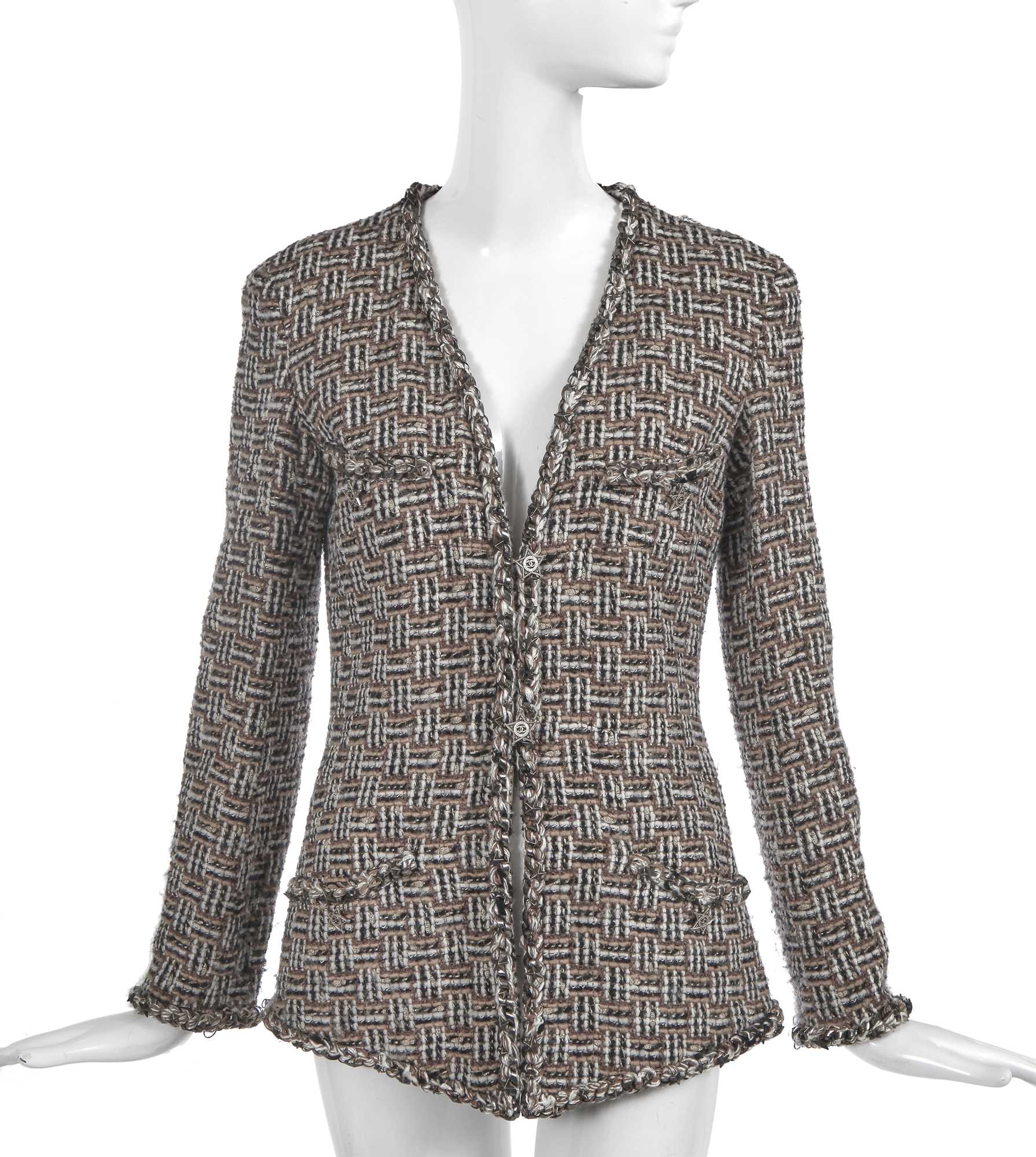 Lot 19 - A Chanel by Karl Lagerfeld brown and black tweed jacket, 'Paris-Dallas' collection, Métiers d'Art, Pre-Fall 2014