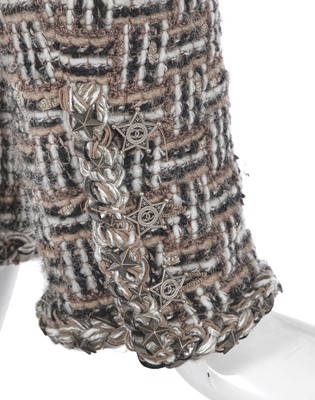 Lot 19 - A Chanel by Karl Lagerfeld brown and black tweed jacket, 'Paris-Dallas' collection, Métiers d'Art, Pre-Fall 2014