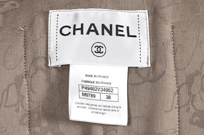 Lot 19 - A Chanel by Karl Lagerfeld brown and black tweed jacket, 'Paris-Dallas' collection, Métiers d'Art, Pre-Fall 2014