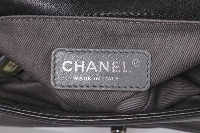 Lot 24 - A Chanel by Karl Lagerfeld black leather Boy bag with embellished strap, 'Paris-Bombay' collection, Métiers d'Art, Pre-Fall 2012