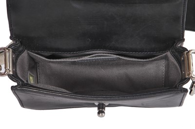 Lot 24 - A Chanel by Karl Lagerfeld black leather Boy bag with embellished strap, 'Paris-Bombay' collection, Métiers d'Art, Pre-Fall 2012