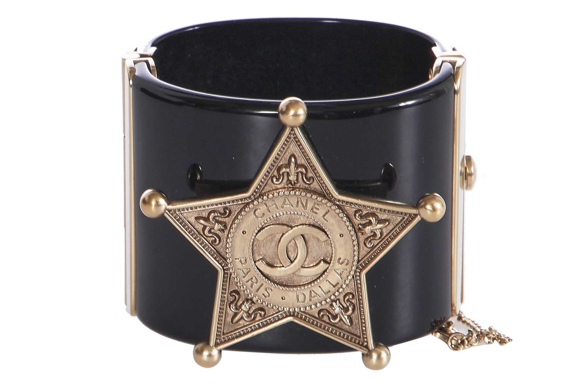 Lot 20 - A Chanel black perspex cuff, 'Paris-Dallas' collection, Métiers d'Art, Pre-Fall 2014