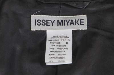 Lot 426 - An Issey Miyake black wool 'Flying Saucer' blazer, Spring-Summer 1994