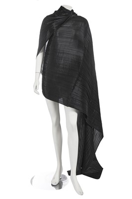 Lot 423 - An Issey Miyake black pleated polyester cloak, circa 1997
