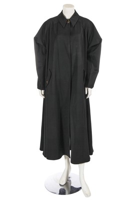 Lot 569 - A Jean Paul Gaultier black gabardine swing coat, 1980s