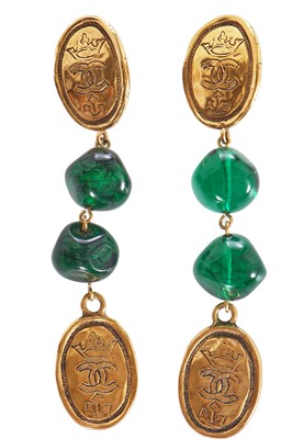 Lot 32 - A pair of Chanel gold-tone and green glass earrings, circa 1990
