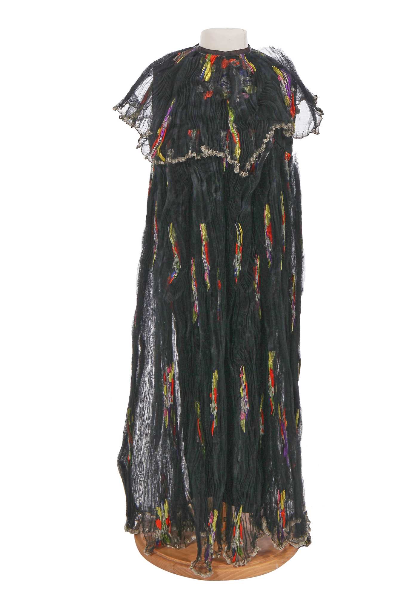Lot 645 - A rare Thea Porter black and multicoloured floral silk child's dress, 1970s