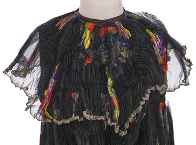 Lot 645 - A rare Thea Porter black and multicoloured floral silk child's dress, 1970s