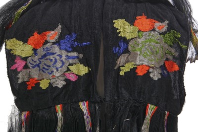 Lot 645 - A rare Thea Porter black and multicoloured floral silk child's dress, 1970s