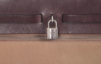 Lot 48 - An Hermès brown leather and canvas Herbag Zip 39, 2010
