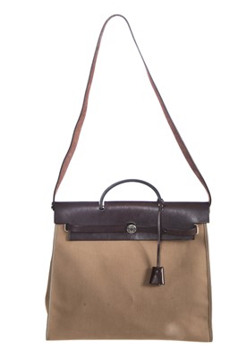 Lot 48 - An Hermès brown leather and canvas Herbag Zip 39, 2010