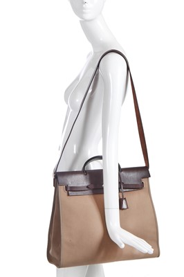 Lot 48 - An Hermès brown leather and canvas Herbag Zip 39, 2010