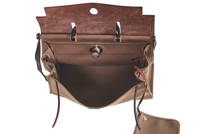 Lot 48 - An Hermès brown leather and canvas Herbag Zip 39, 2010