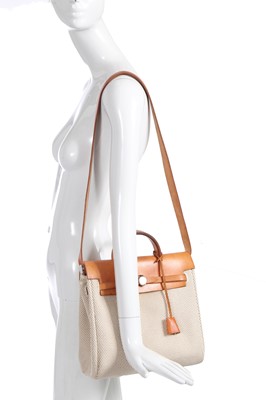Lot 51 - An Hermès vache leather and natural toile canvas Herbag 2-in-1, 2003